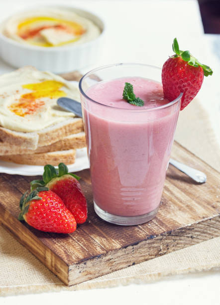 Breakfast: toast and smoothie stock photo