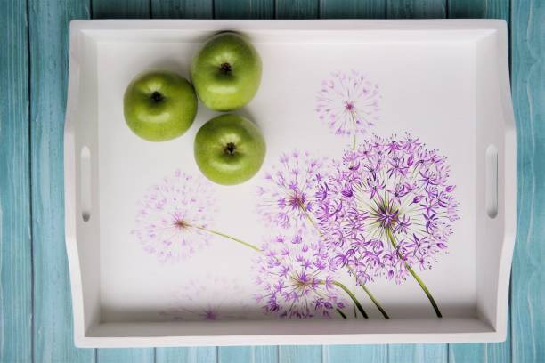 breakfast tray flowers with green apples stock photo