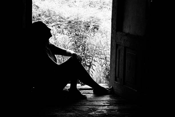 breathe silhouette of a woman in doorway (shot in b/w) rapes stock pictures, royalty-free photos & images