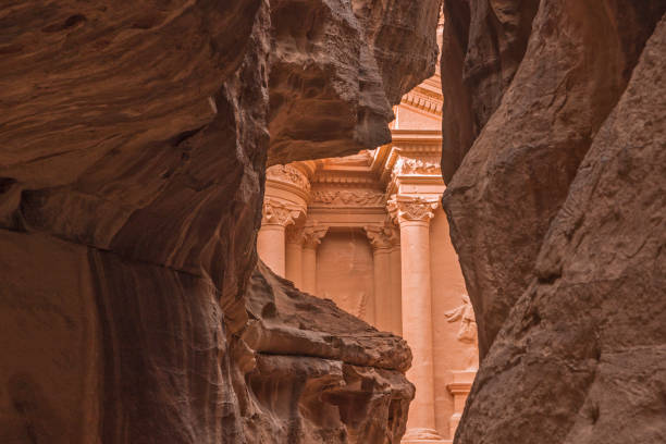 Breathtaking portal of Al Khazneh (Treasury) from Siq canyon. Wadi Musa, Petra, Jordan stock photo