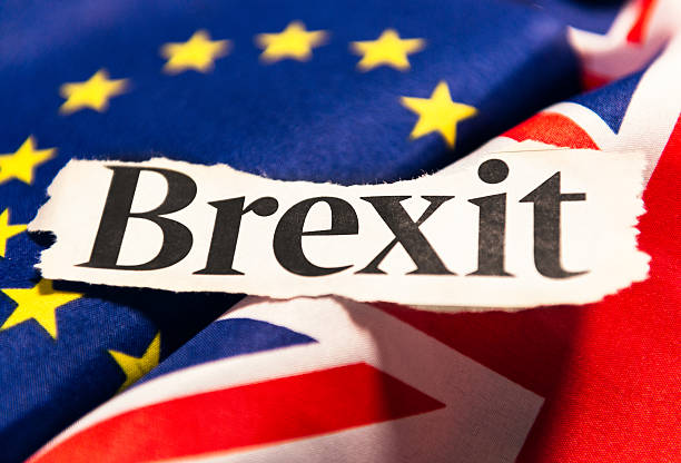 Brexit - British Exit from the European Union The word 'Brexit' from a newspaper headline, following the UK decision to leave the European Union, following a public referendum held on 23rd June 2016. brexit stock pictures, royalty-free photos & images