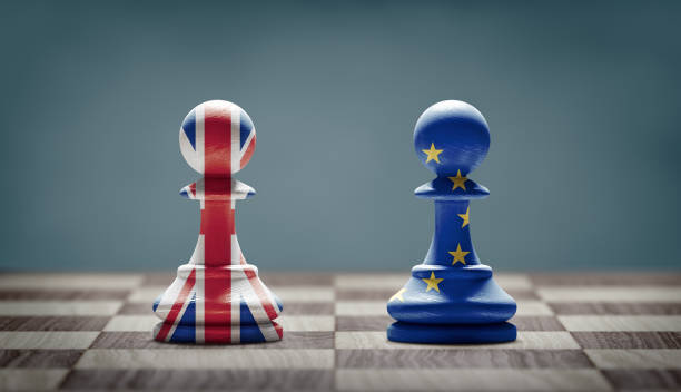 Brexit concept.United Kingdom and European Union flags on chess pawns. 3d illustration Brexit concept.United Kingdom and European Union flags on chess pawns on a chessboard. 3d illustration. brexit stock pictures, royalty-free photos & images