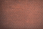 istock Brick wall background 1299424627