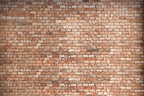 brick wall - baksteen stockfoto's en -beelden