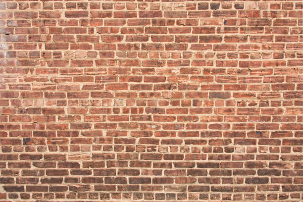 Brick Wall with Dark Gradient at Bottom Brick Wall with Dark Gradient at Bottom brick wall stock pictures, royalty-free photos & images