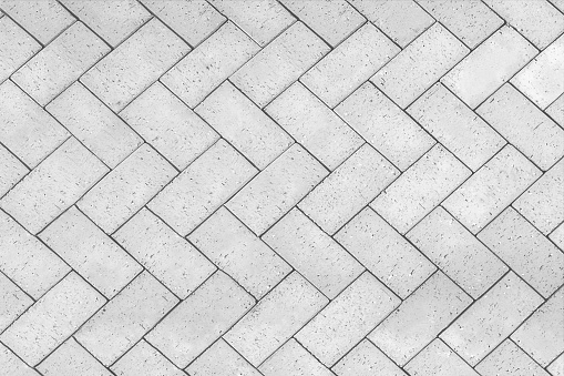 Bricks tiled floor with zigzag pattern texture background