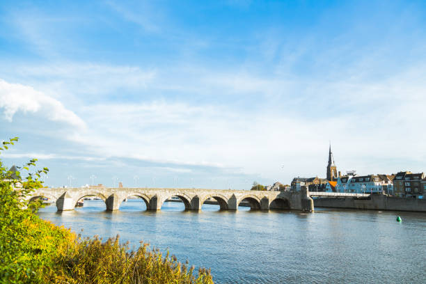 Bridge across Meuse river stock photo