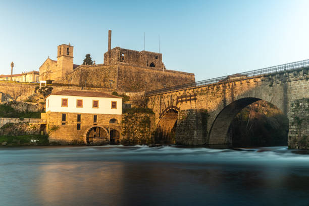 Bridge and old town of Barcelos Bridge and old town of Barcelos, Portugal. On the Camino de Santiago. barcelos stock pictures, royalty-free photos & images