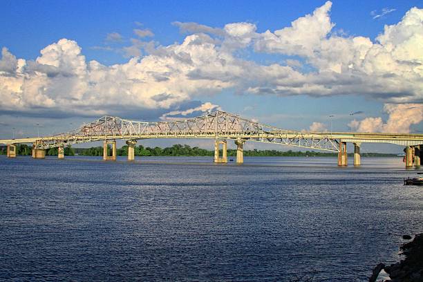 Bridge Bridge spanding the Tennessee river noth of Decatur Alabama. tennessee river stock pictures, royalty-free photos & images