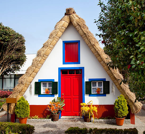 Bright and cheery traditional cottage on Madeira Island stock photo