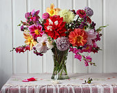istock bright autumn bouquet of dahlias and asters on the table 1339314411