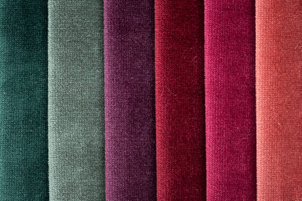 Bright collection of colorful velour textile samples. Fabric texture stock photo