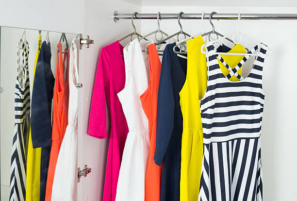 bright modern fashion women's dresses stock photo