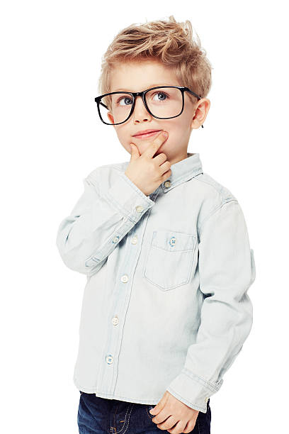 Bright young mind A sweet little boy wearing glasses looking thoughtfulhttp://195.154.178.81/DATA/i_collage/pi/shoots/782313.jpg boys glasses stock pictures, royalty-free photos & images