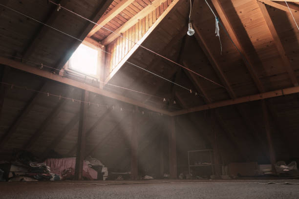 brighten attic with light rays at window brighten attic with light rays at window attic stock pictures, royalty-free photos & images