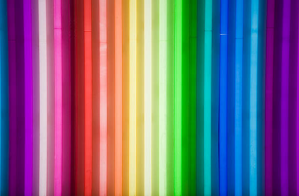 Brightly colored strips of neon rainbow stock photo