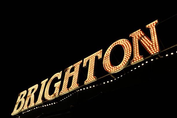 Brighton. Spelt out in lights. A neon sign spelling Brighton. Taken after dark on Brighton pier in Sussex UK. brighton stock pictures, royalty-free photos & images