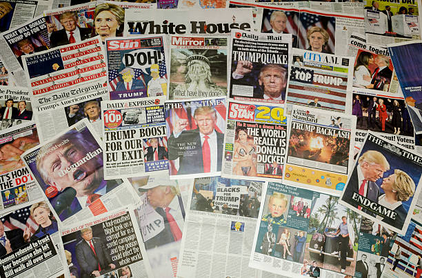 British newspapers reporting on the US presidential election result London, England - November 10, 2016: British newspaper front pages reporting on the US presidential election result in which Donald Trump became the 45th president of the United States. donald trump stock pictures, royalty-free photos & images