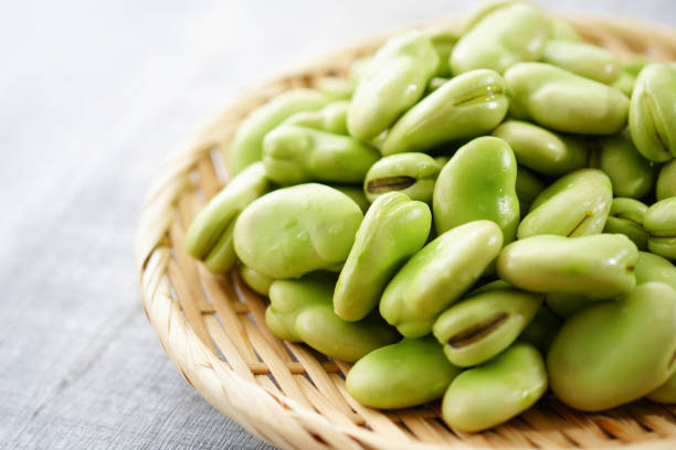 broad beans broad beans broad bean stock pictures, royalty-free photos & images