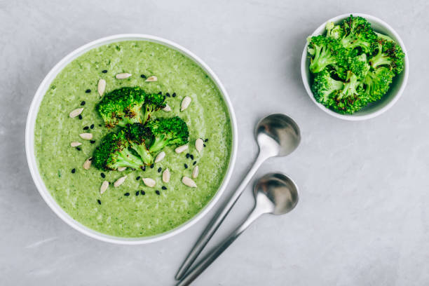 Broccoli cream soup with sunflower and sesame seeds. stock photo