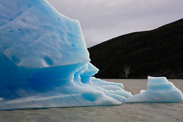 Broken Blue Iceberg at Grey Glacier stock photo