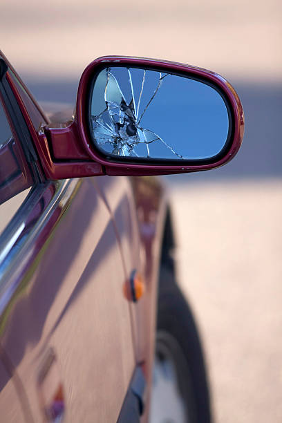 Broken car mirror stock photo