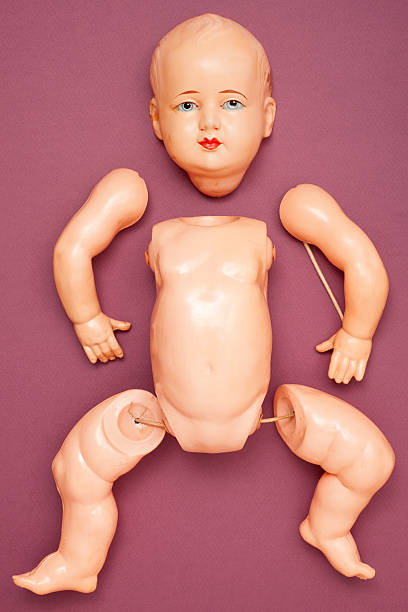 Broken doll Top view of dismembered old vintage doll broken doll 1 stock pictures, royalty-free photos & images