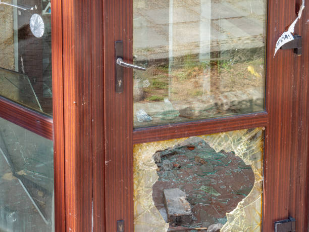 broken door after a burglary in the shop broken door after a burglary in the shop vandalism stock pictures, royalty-free photos & images