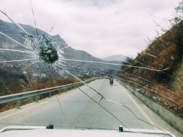 Broken front windshield of car stock photo