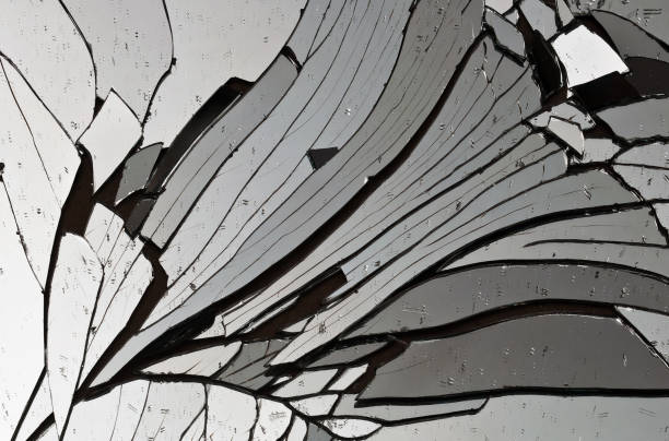 Broken mirror creating an abstract design stock photo