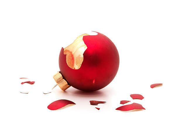 Broken red ornament on a white background stock photo