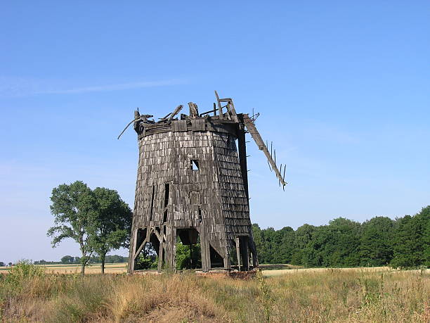 Broken windmill stock photo