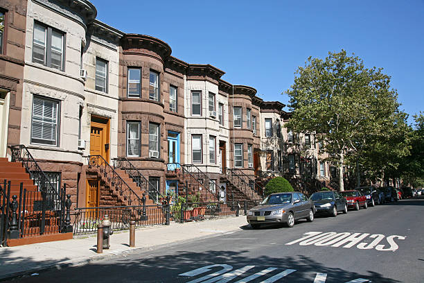 Brooklyn Brownstones "Row house apartments in Sunset Park, Brooklyn, NY, USA." brownstone stock pictures, royalty-free photos & images