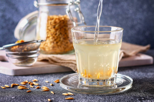 Broth, infusion of oat grains. Oat kvass, jelly is a healthy drink. stock photo