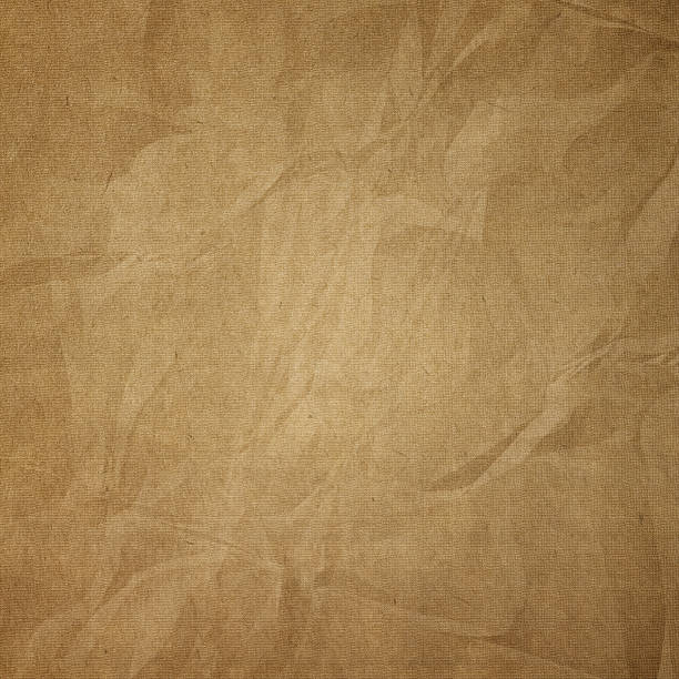 Brown crumpled craft paper texture  stock photo