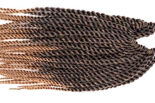 Close-up of brown hair extension braids