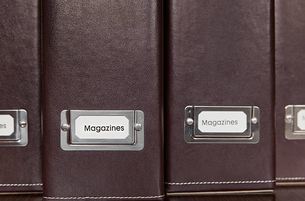 Brown leather magazine holders stock photo