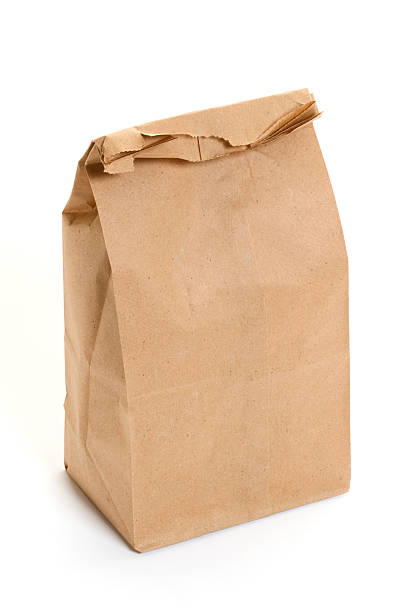 brown paper bag lunch on a white background - brown paper bag bildbanksfoton och bilder