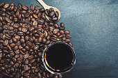 istock Brown roasted whole coffee bean background 1385078348