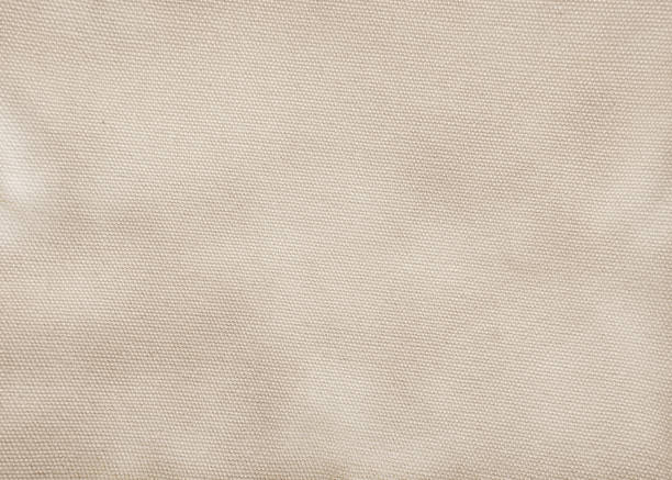 bruine sepia katoenweefsel geweven canvas textuur met grijs patroon achtergrond. zachte focus linnen zak craft design. - canvas stockfoto's en -beelden