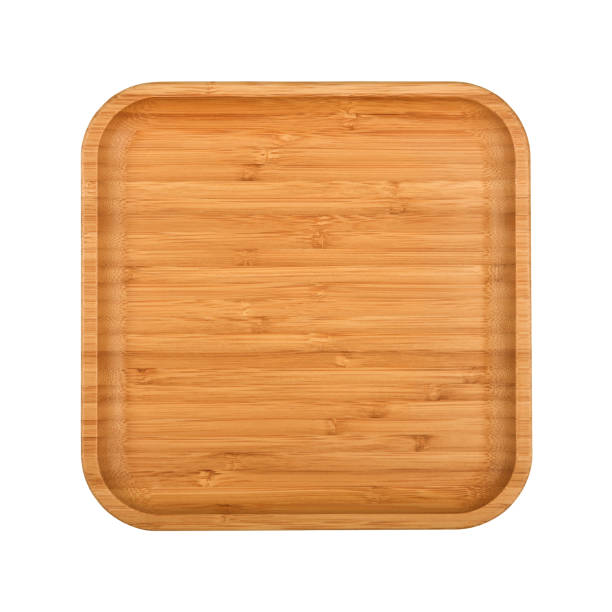 Brown wooden tray plate isolated on white stock photo