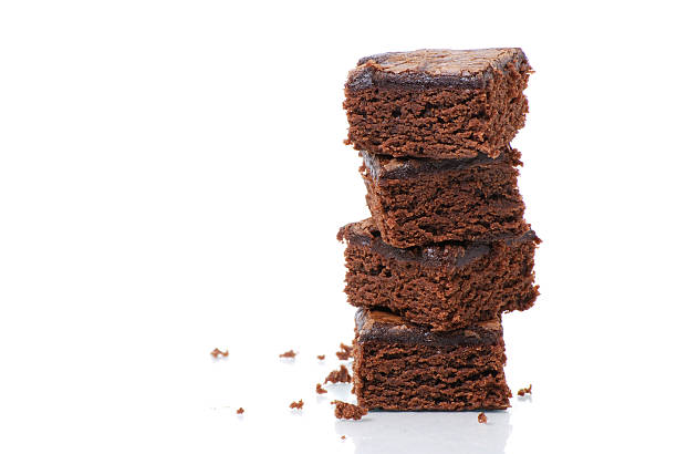 Brownie Tower brownies on white background brownie stock pictures, royalty-free photos & images