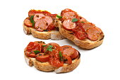 bruschetta with sausage, tomato sauce and onions