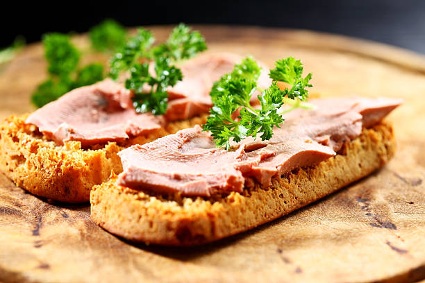 Bruschetta with liver pate Bruschetta with liver pate - gourmet food liver pâté photos stock pictures, royalty-free photos & images