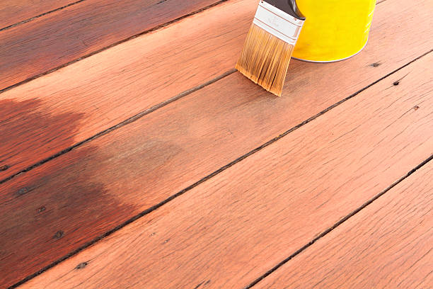 brush tin and decking oil for a timber deck  deck stock pictures, royalty-free photos & images