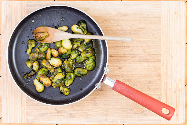 Brussel sprouts cooked in non-stick pan stock photo