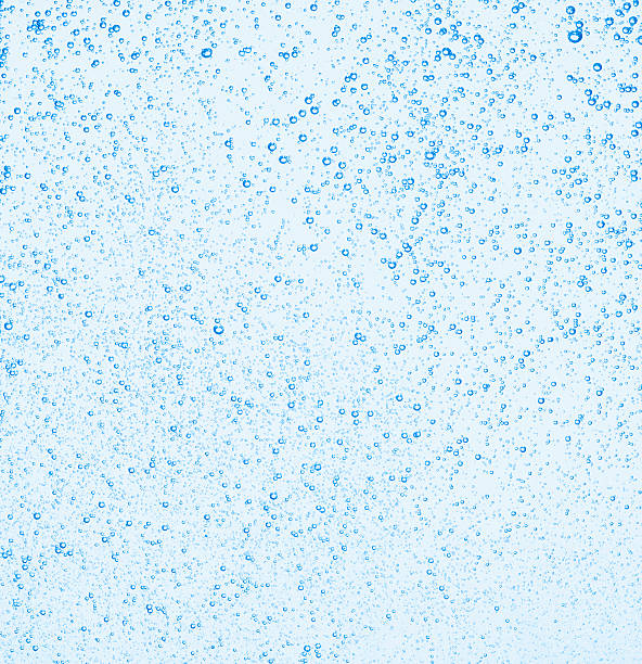 Bubbles Blue Carbonated Bubbles in soda bubble wand stock pictures, royalty-free photos & images