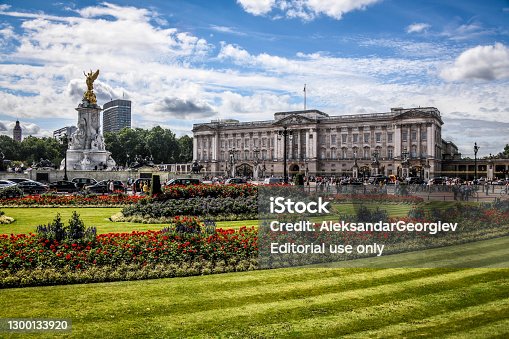 istock Buckingham Palace Park And Victoria Memorial In London, UK 1300133920