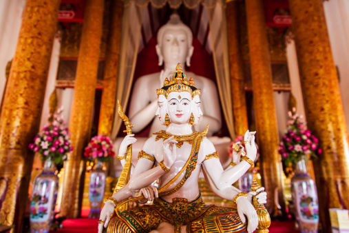 Chiang Rai, Thailand - May 3, 2013: Buddha statue with plural faces at the temple named Wat Khrua Khrae in Chiang Rai, Thailand.