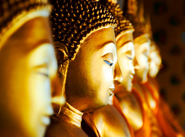 buddhas at wat arun, bangkok, thailand - bangkok stok fotoğraflar ve resimler